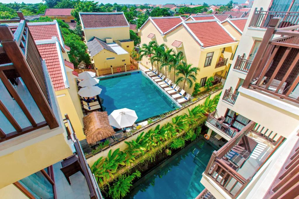 an aerial view of a house with a swimming pool at Silkotel Hoi An in Hoi An