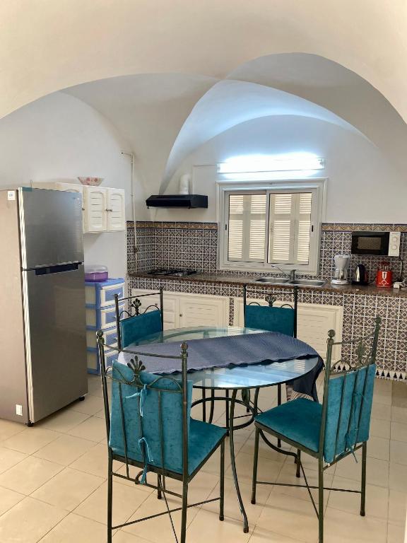Kuchyň nebo kuchyňský kout v ubytování BUNGALOW El HOUDA