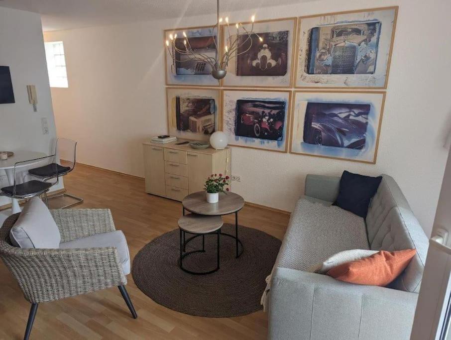 a living room with a couch and a table at Ferienwohnung in Göppingen in Göppingen