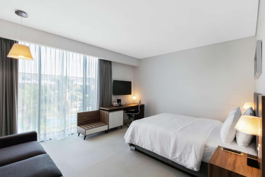 Cama ou camas em um quarto em Hampton Inn By Hilton Cancun Cumbres