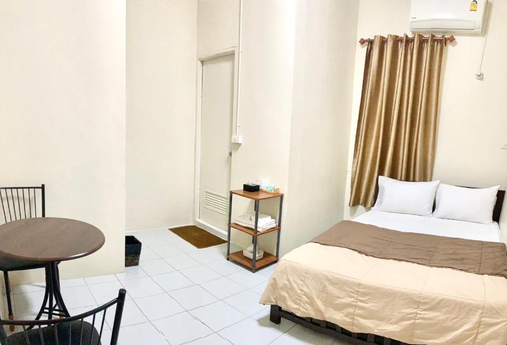 Postel nebo postele na pokoji v ubytování PD Hostel