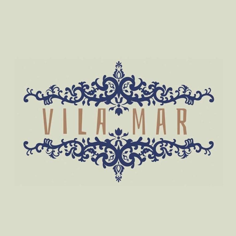 an illustration of a vintage baroque ornament with the word vanna man illustration at Vila Mar in Fernando de Noronha