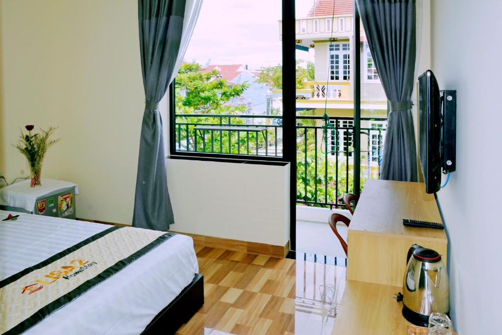 Postel nebo postele na pokoji v ubytování Lisa homestay 2