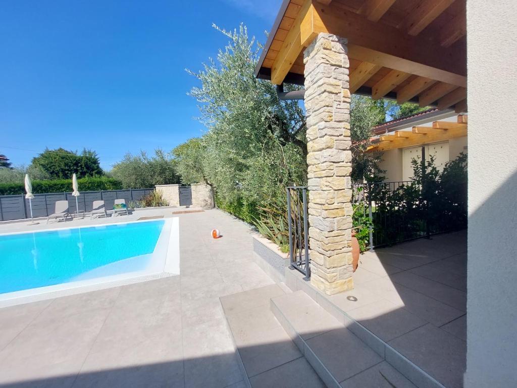 Casa Pergola 2 - Fronte piscina, parcheggio, Bardolino – Prezzi aggiornati  per il 2024