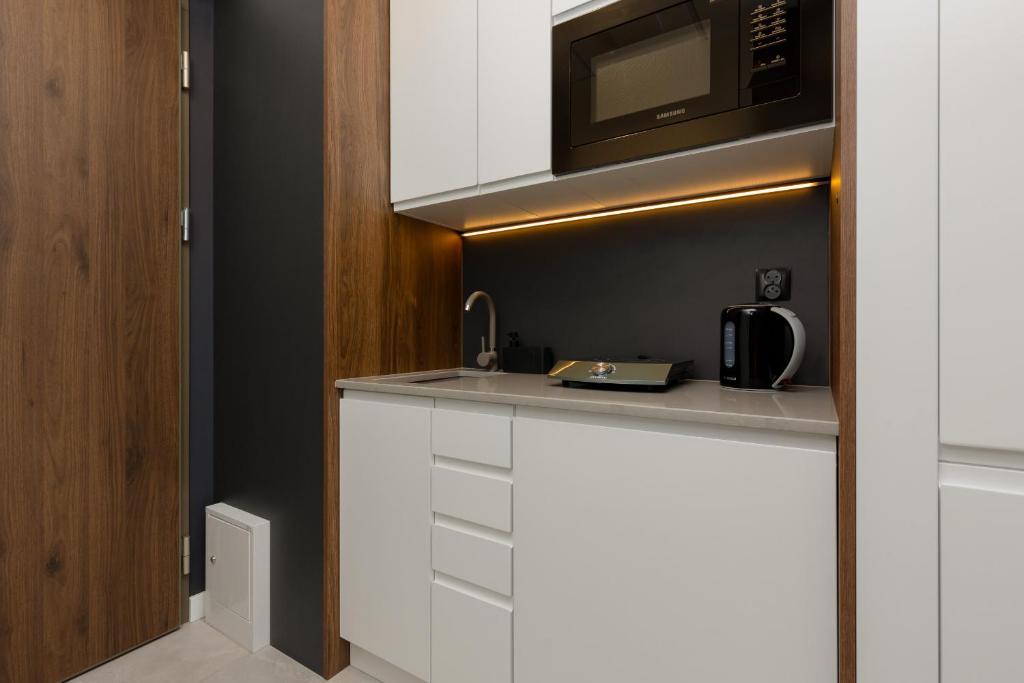 Exceptional Business Apartments by Noclegi Renters - Resim 19