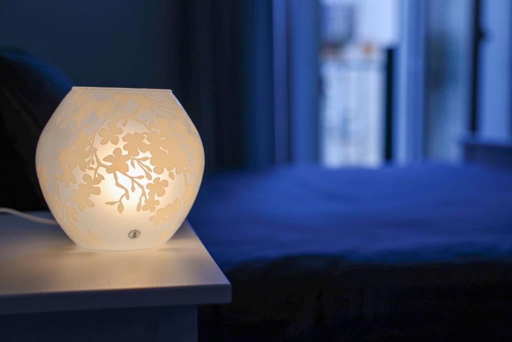 Postel nebo postele na pokoji v ubytování Bella 'Mbriana Home