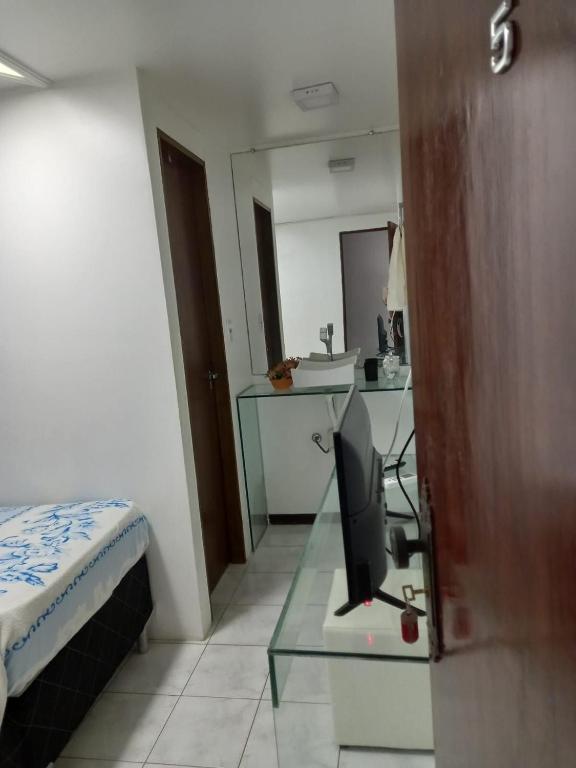 Voodi või voodid majutusasutuse Pousada Aconchego do Tambaú toas