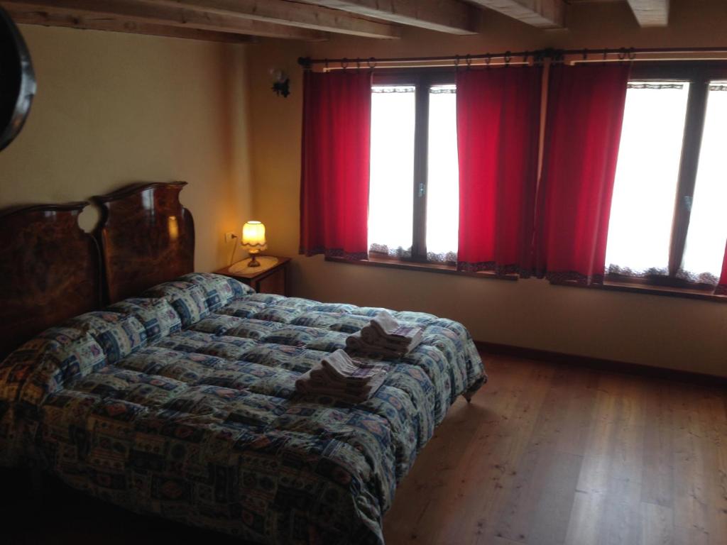 Postel nebo postele na pokoji v ubytování Agriturismo Dagai