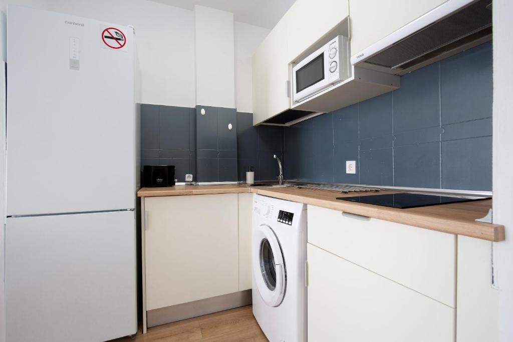 Kuchyň nebo kuchyňský kout v ubytování Apartamento Playa Morro Jable 2a