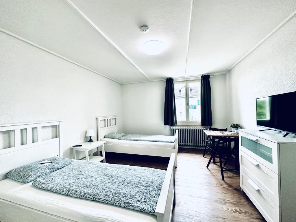 Una cama o camas en una habitación de Monteurzimmer - Worker's accommodation - ZIMMERzuVERMIETEN in Biberist