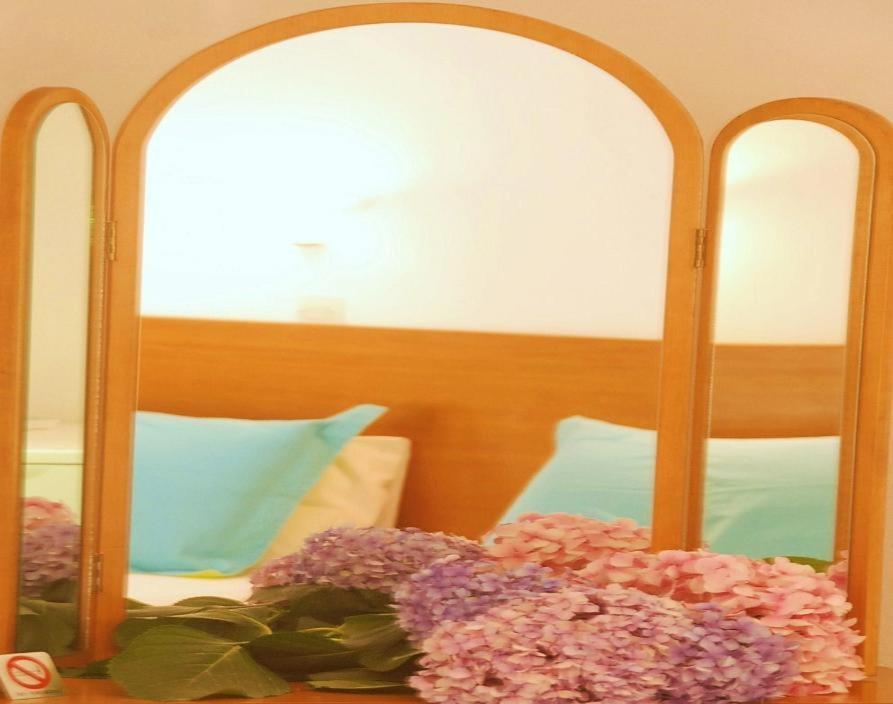 Postel nebo postele na pokoji v ubytování Orpheus Hotel