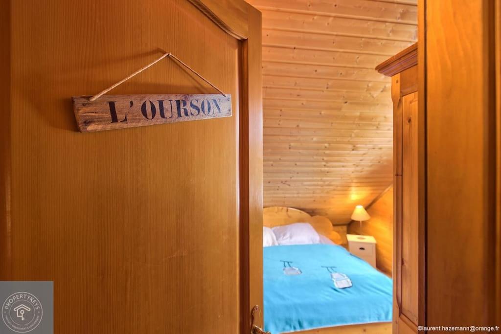 Posteľ alebo postele v izbe v ubytovaní Chalet Les Brimbelles avec Jacuzzi