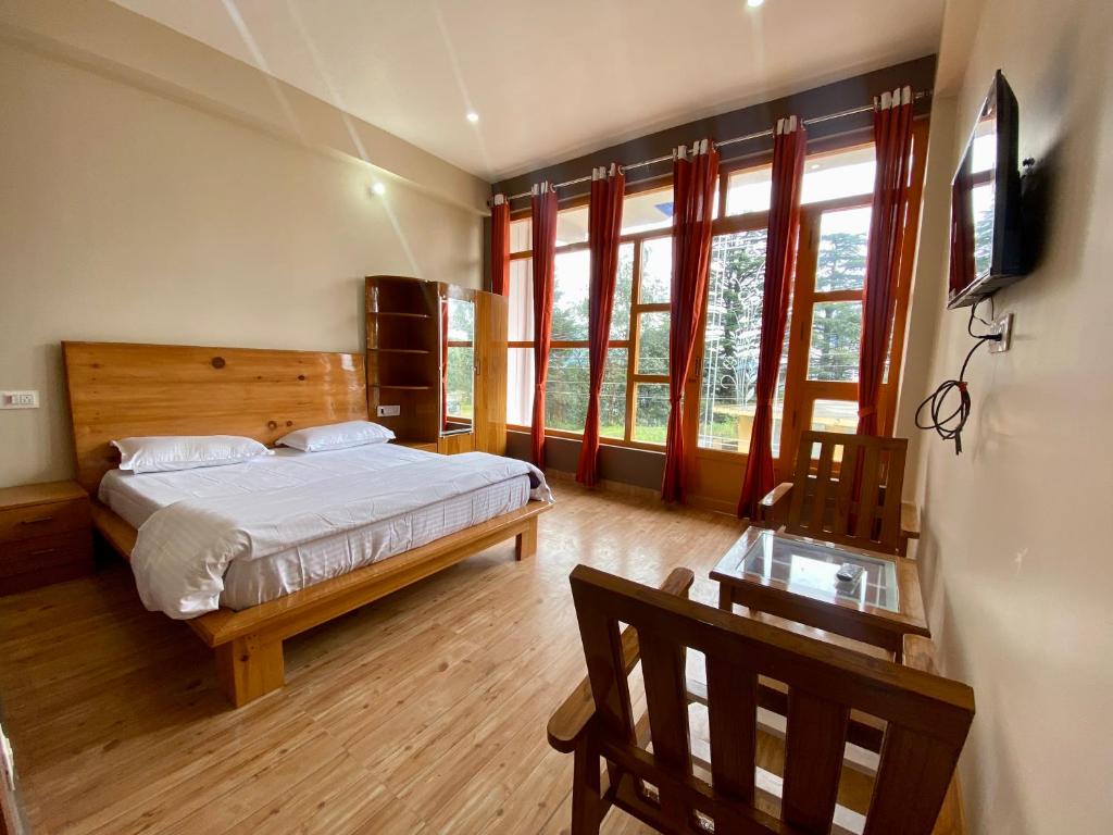 Hotel Mansarovar Inn - Housity