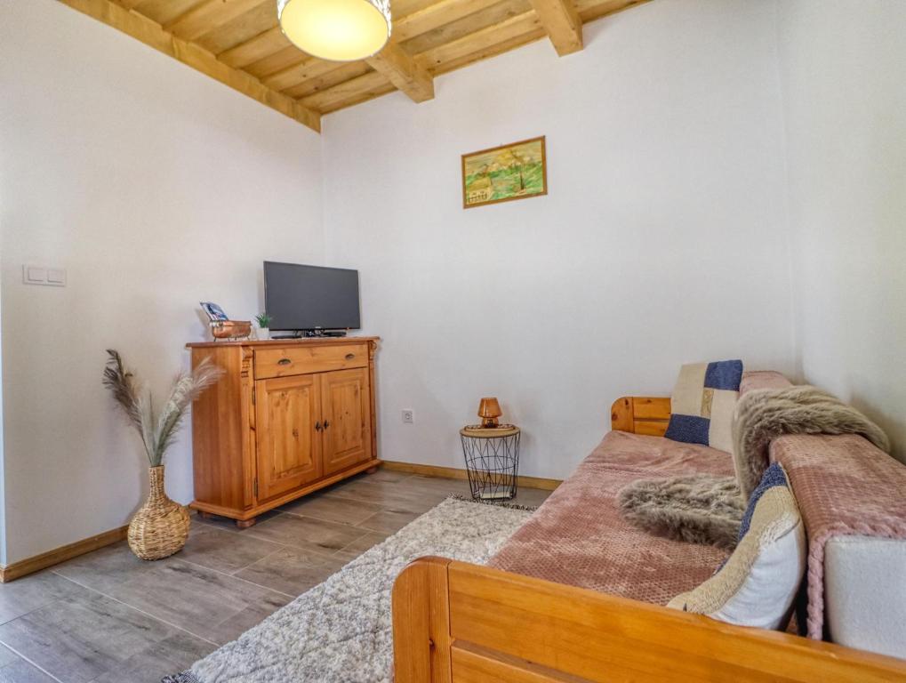 Postel nebo postele na pokoji v ubytování Nyírfa-Lak Apartman