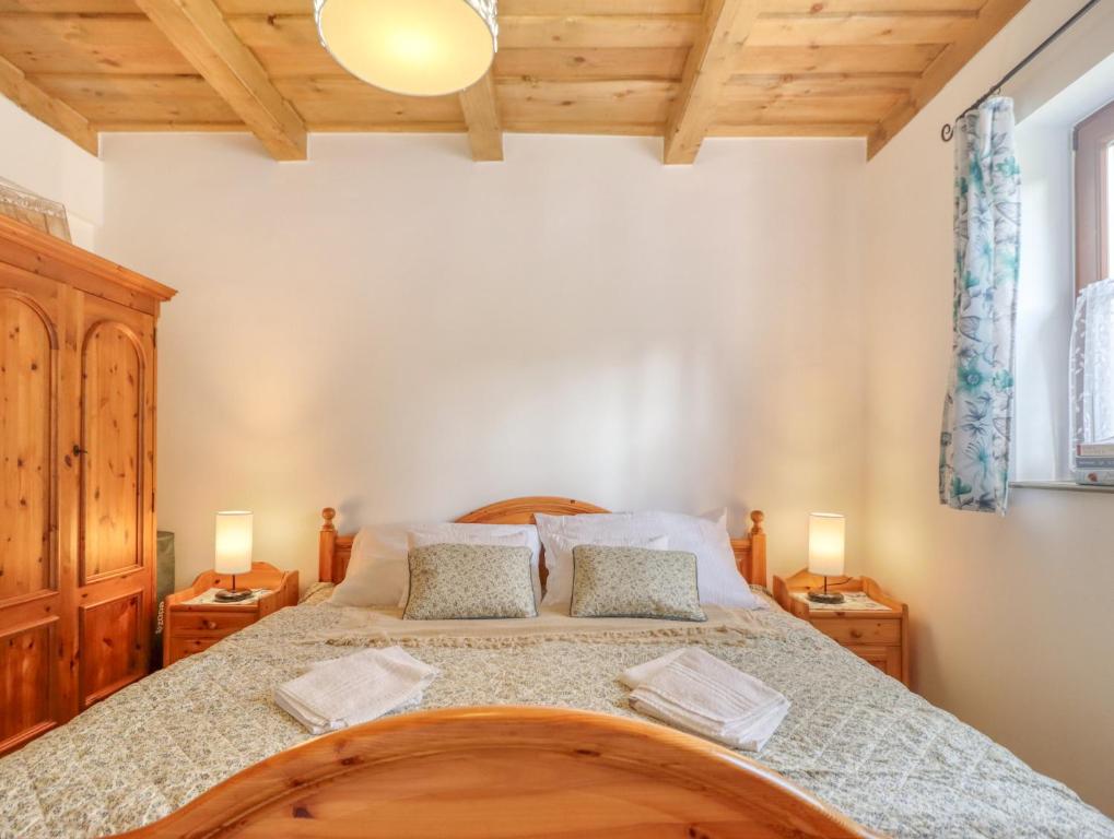 Postel nebo postele na pokoji v ubytování Nyírfa-Lak Apartman