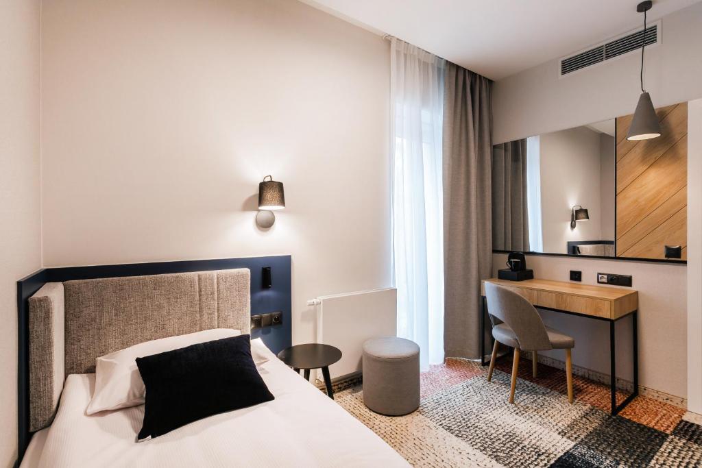 Postel nebo postele na pokoji v ubytování Hotel Vesper House