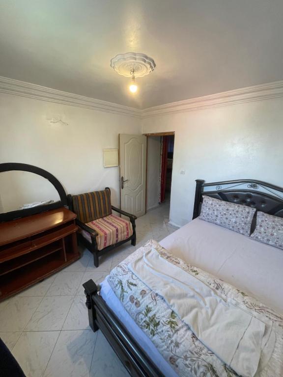 Ένα ή περισσότερα κρεβάτια σε δωμάτιο στο The Blue Gate house
