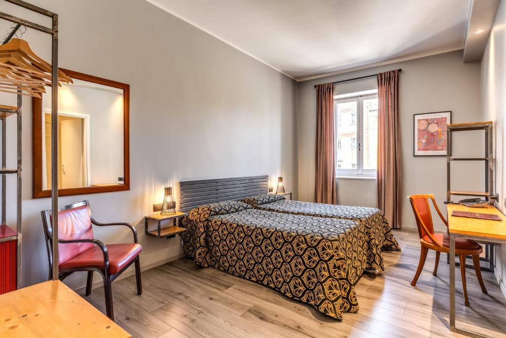 Postel nebo postele na pokoji v ubytování Hotel King
