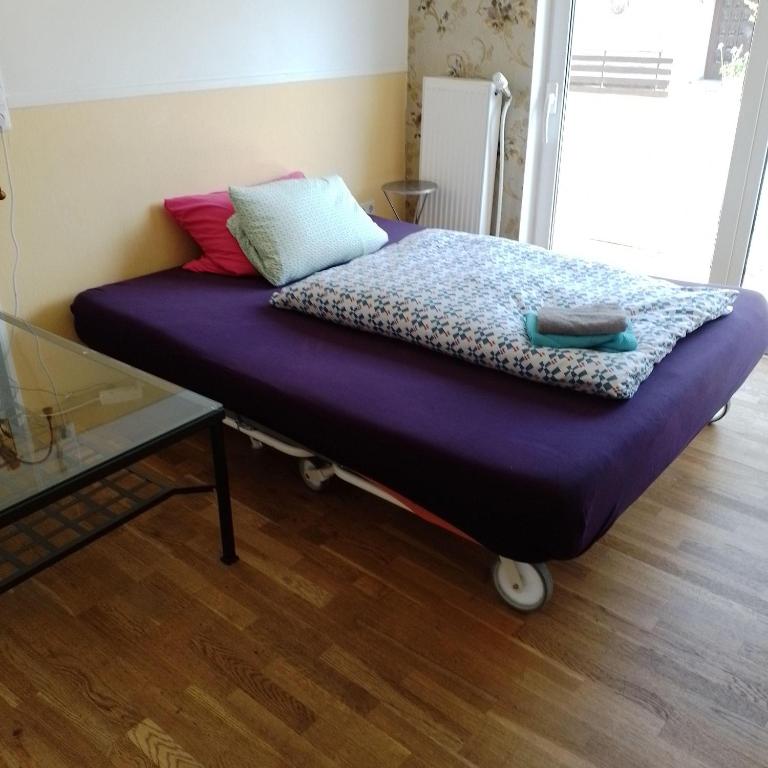 Cama ou camas em um quarto em Apartment-Nordstern-charmant-und-geraeumig