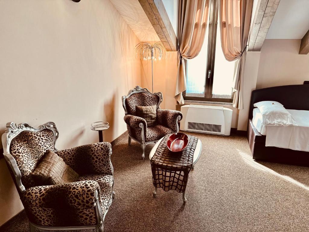 Postel nebo postele na pokoji v ubytování Hotel Malpensa INN Aereoporto