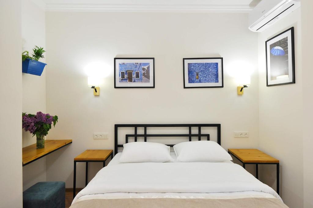 Postel nebo postele na pokoji v ubytování Hotel Art Nikola Rooms