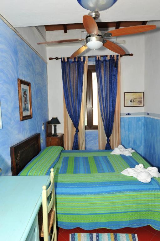 Posteľ alebo postele v izbe v ubytovaní B&B Tony and Judy