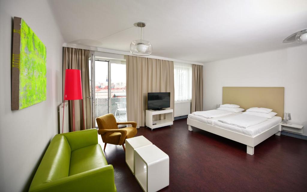 TV a/nebo společenská místnost v ubytování Stanys - Das Apartmenthotel