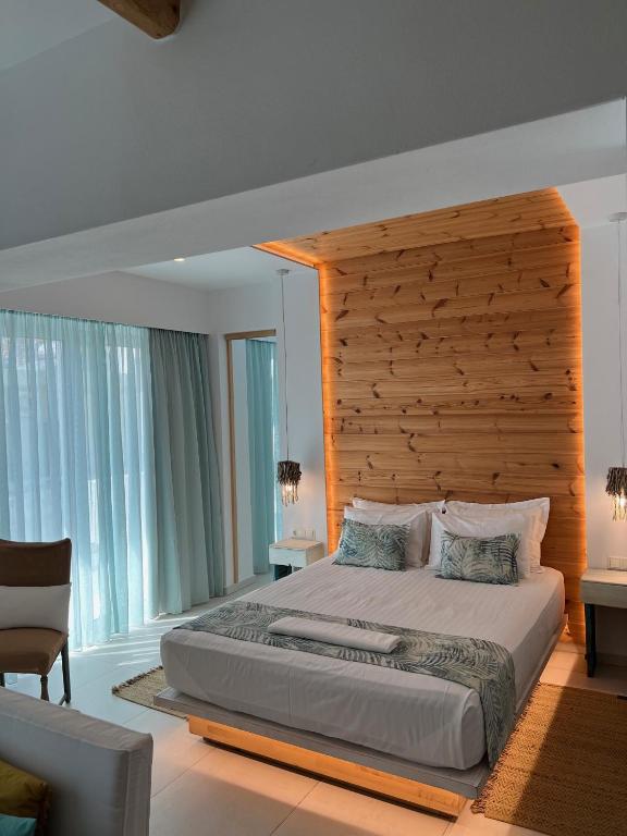 Postel nebo postele na pokoji v ubytování Notus Suites