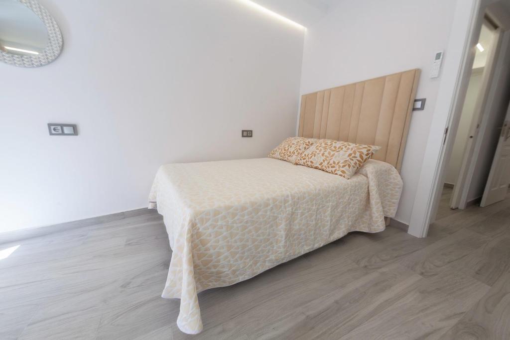 Postel nebo postele na pokoji v ubytování VTAR Puerta Del Sol