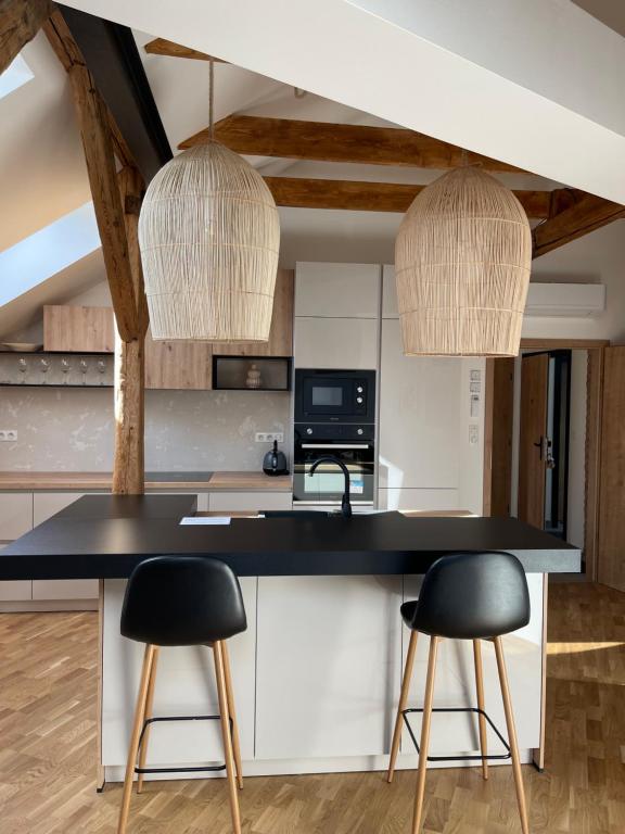 Kuchyň nebo kuchyňský kout v ubytování Apartmány Marienhof