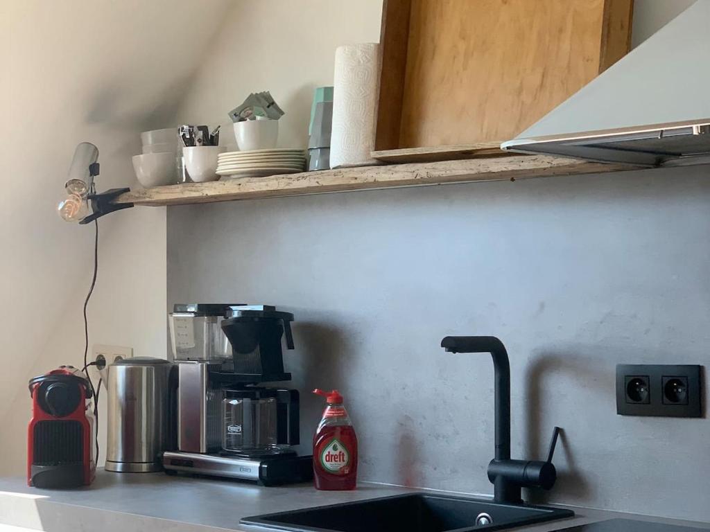 Kuchyň nebo kuchyňský kout v ubytování Zolder appartement Le Grenier