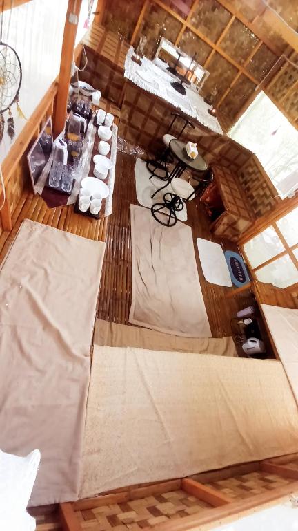 an overhead view of a living room in a boat at Wellness & Fitness In Life La Union Postural & Joint Alignment Yoga Retreat Yoga Session Center 