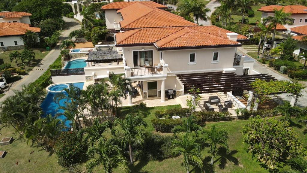 an aerial view of a house with a swimming pool at Pearl Court 1111 at Pristine Bay in French Harbour