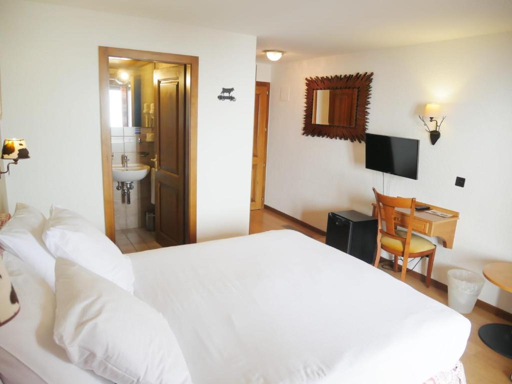 Postel nebo postele na pokoji v ubytování Between Boutique Hotel