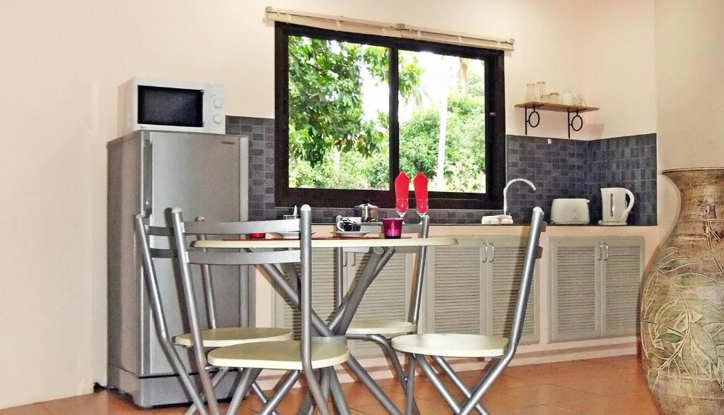 Kuchyň nebo kuchyňský kout v ubytování Soleil D'asie Residence