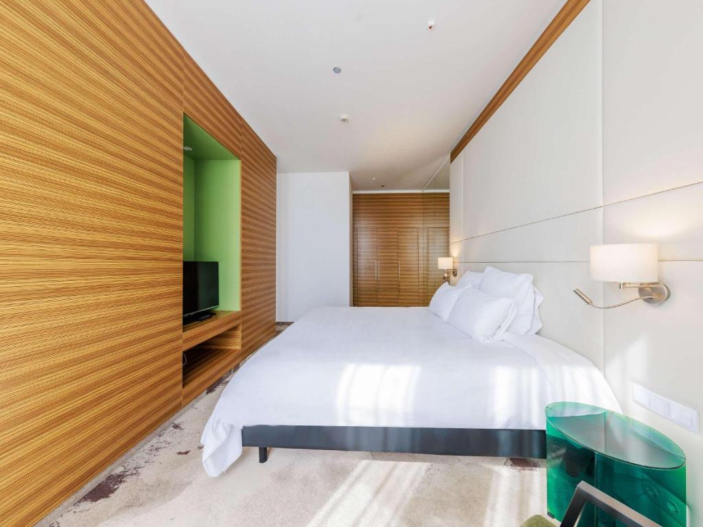 Voodi või voodid majutusasutuse Mercure Tallinn toas