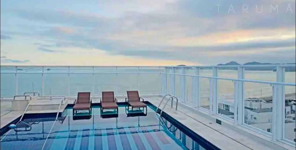 a swimming pool on the top of a cruise ship at Flat vista mar em Santos in Santos