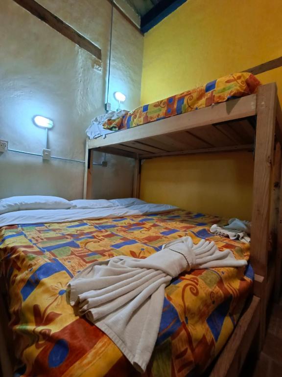 Postel nebo postele na pokoji v ubytování Rossco Hostel