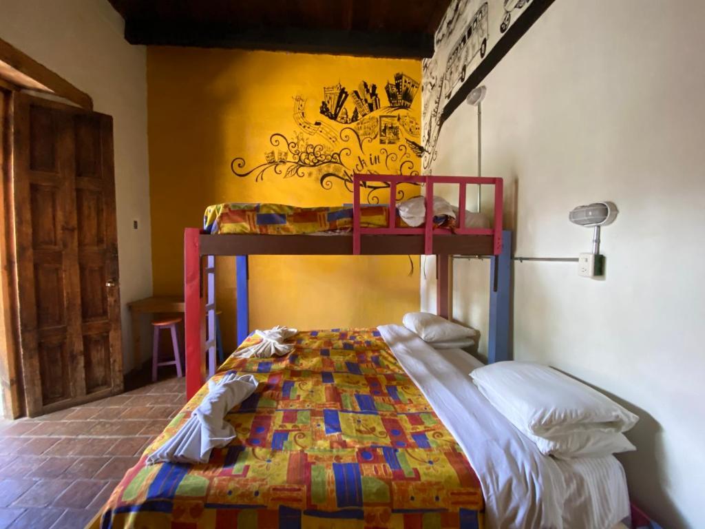 Postel nebo postele na pokoji v ubytování Rossco Hostel