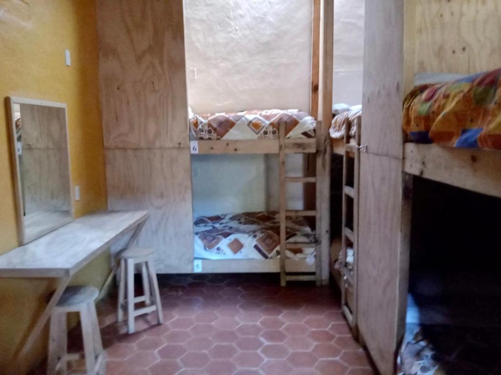 Postel nebo postele na pokoji v ubytování Rossco Hostel
