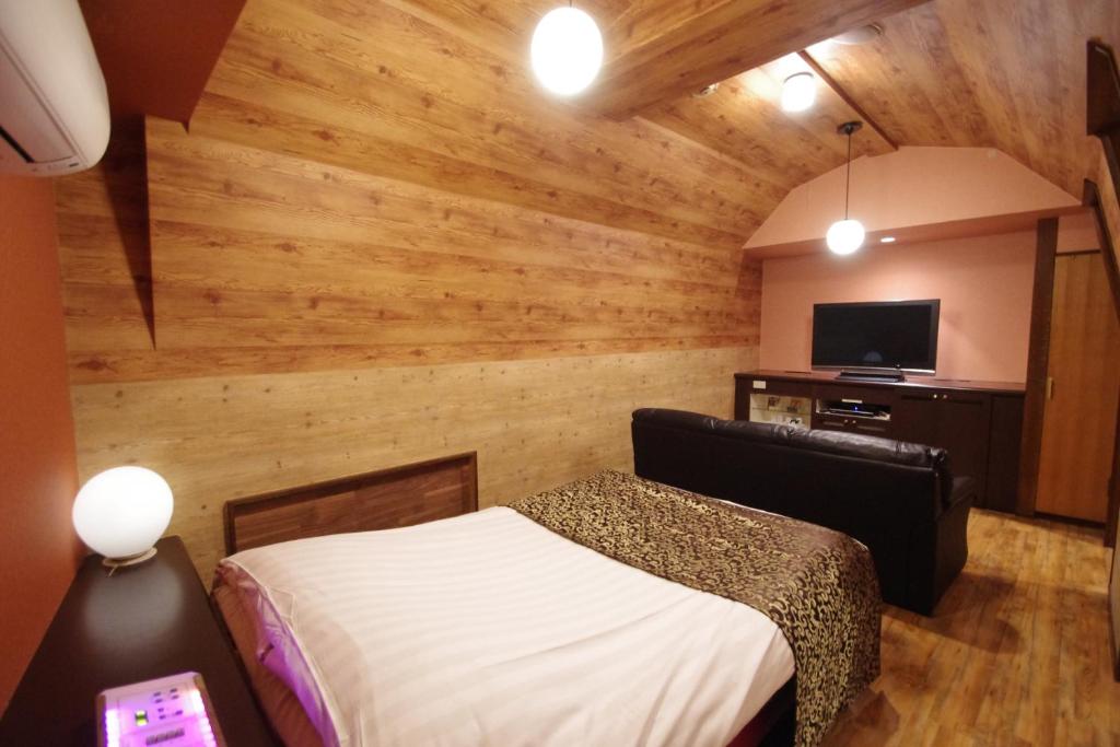 TV a/nebo společenská místnost v ubytování Hotel P'sResort Adults only 大人専用
