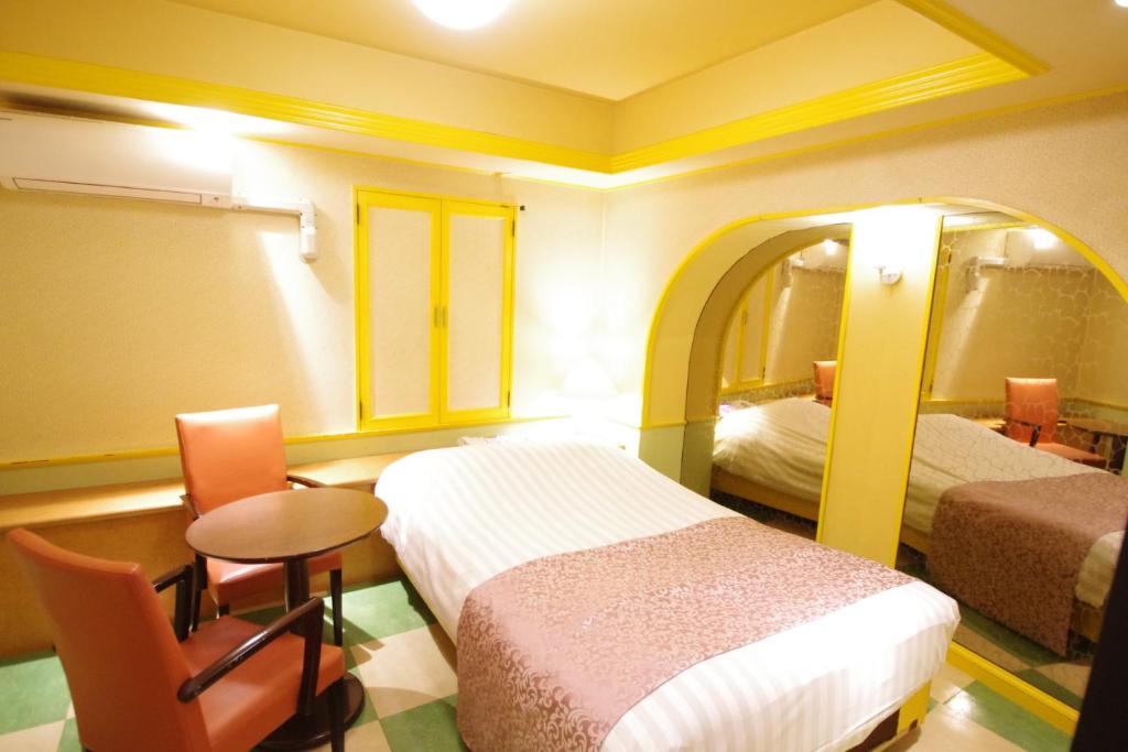 Postel nebo postele na pokoji v ubytování Hotel P'sResort Adults only 大人専用