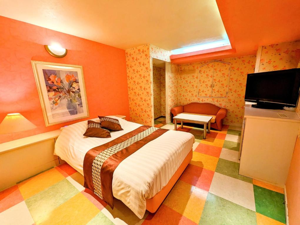 Postel nebo postele na pokoji v ubytování Hotel P'sResort Adults only 大人専用
