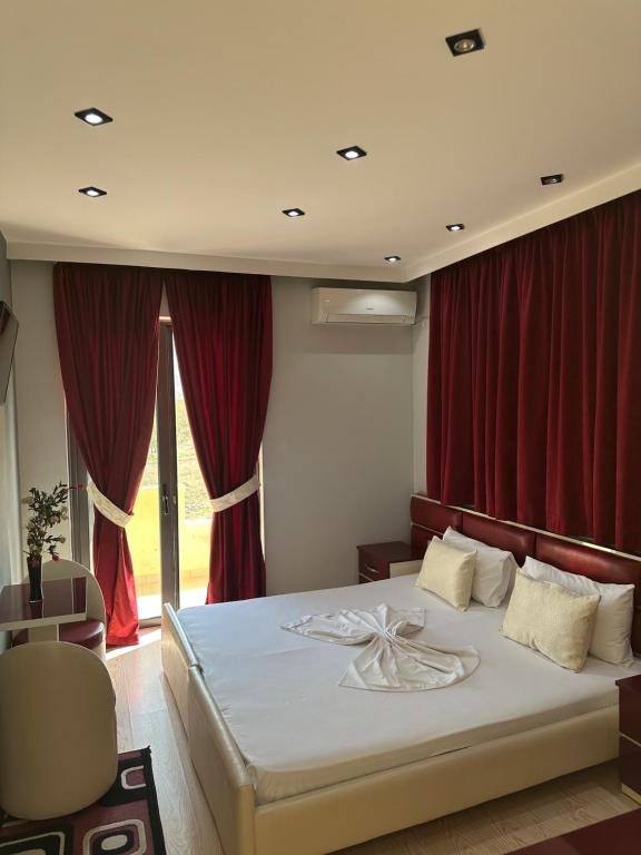 Postel nebo postele na pokoji v ubytování Hotel Selfo