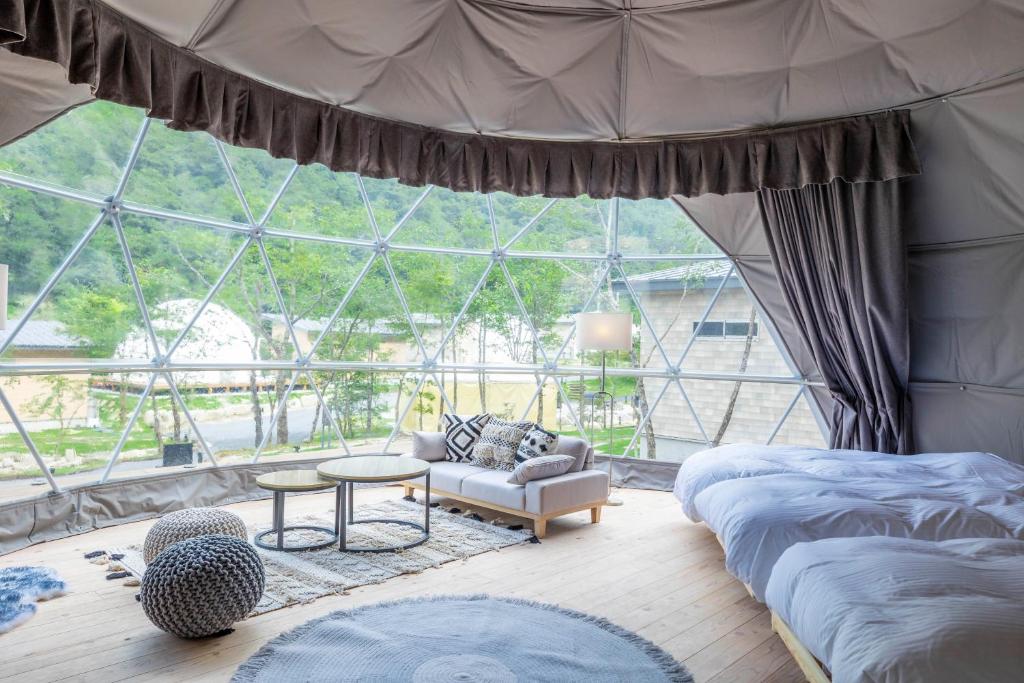Postel nebo postele na pokoji v ubytování mokki STARDUST GLAMPING