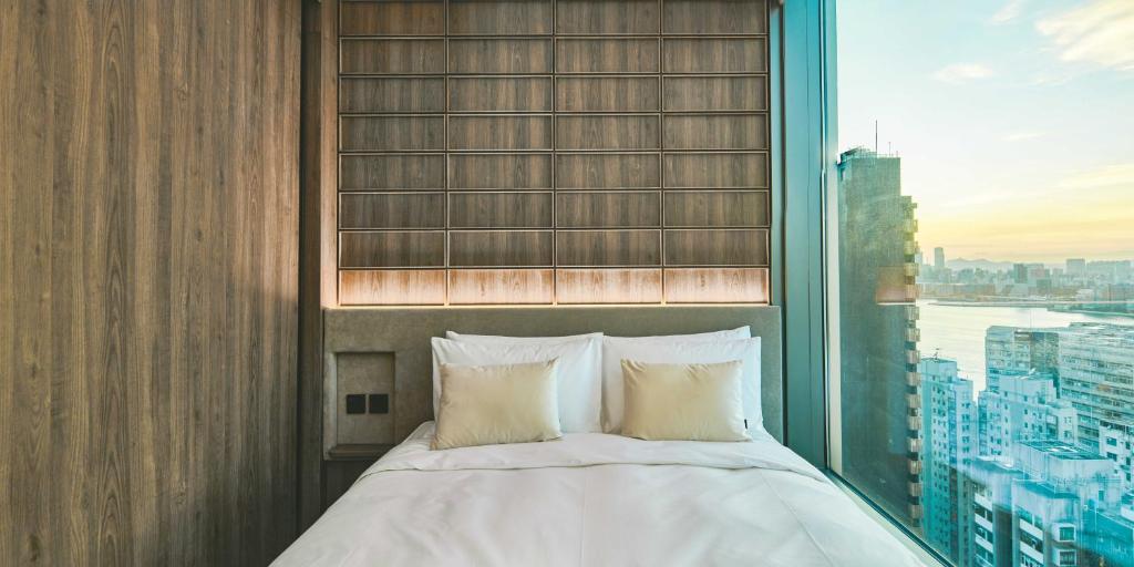 Letto o letti in una camera di The Stellar