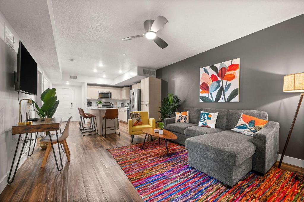 a living room with a couch and a table at Sleek & Stylish Salt Lake City APT Prime Loc in Salt Lake City