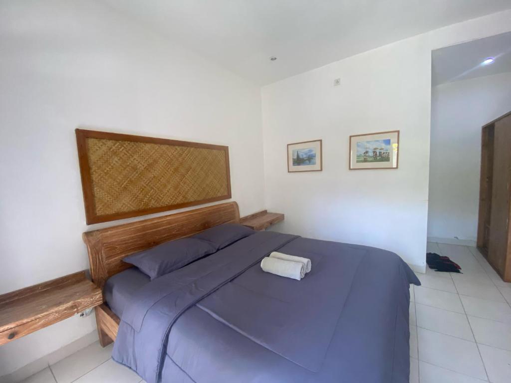 Postel nebo postele na pokoji v ubytování Ashana Hotel
