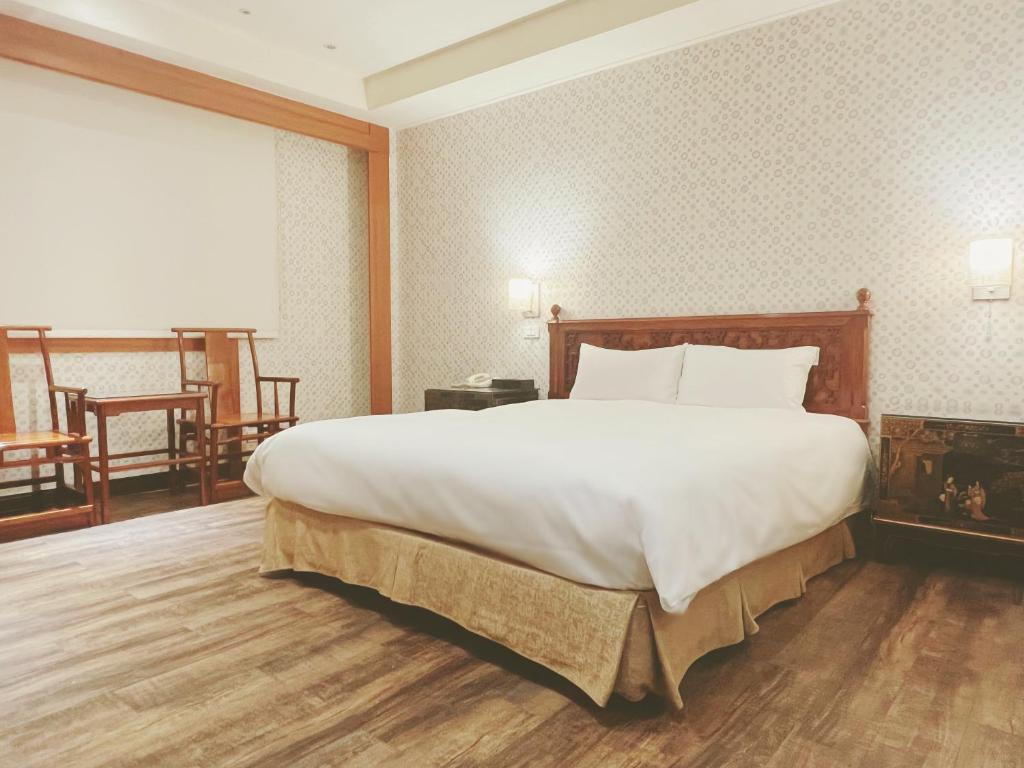 Postel nebo postele na pokoji v ubytování 喜客商旅 Seeker Hotel - Sanchong