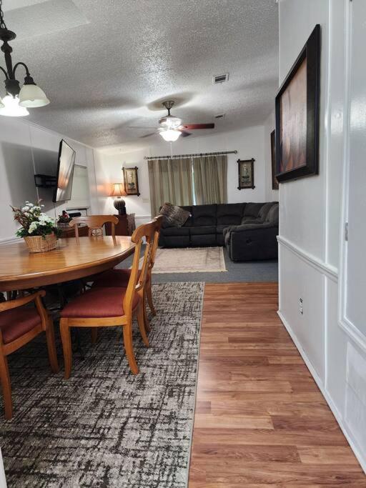 a living room with a table and a couch at Your second home in florida in Altoona